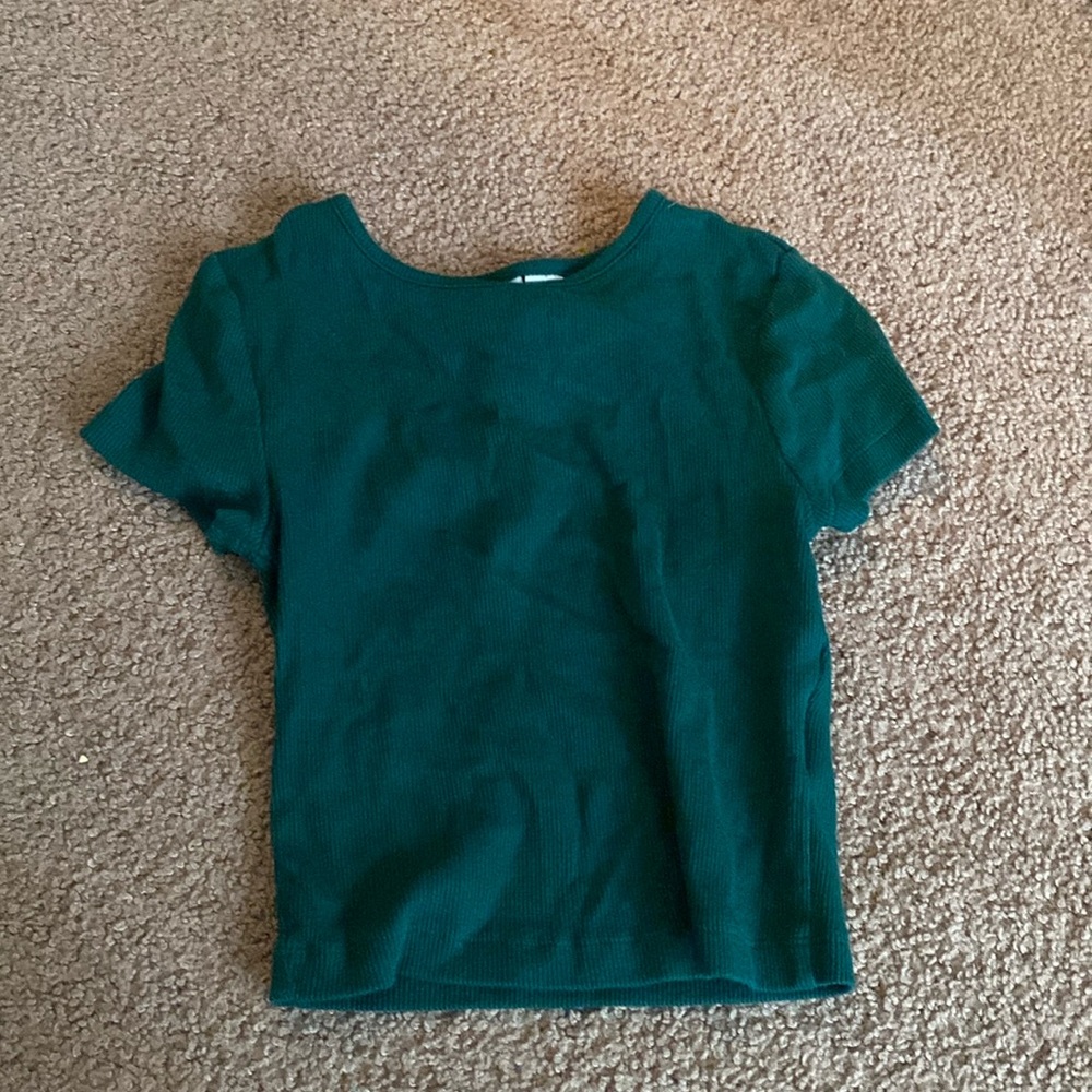 Teal green ribbed crop top.